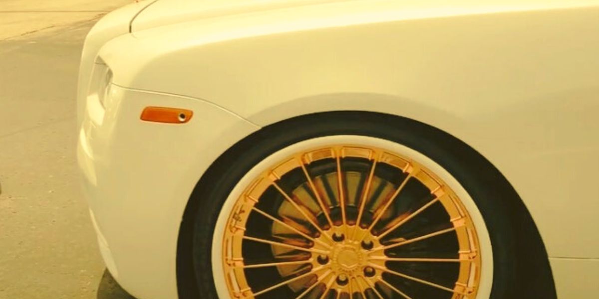 white cars with gold rims